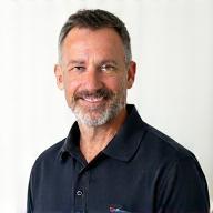 Professional headshot of David Lee, an experienced heavy equipment operator