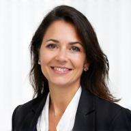 Professional headshot of Maria Garcia, a construction safety expert